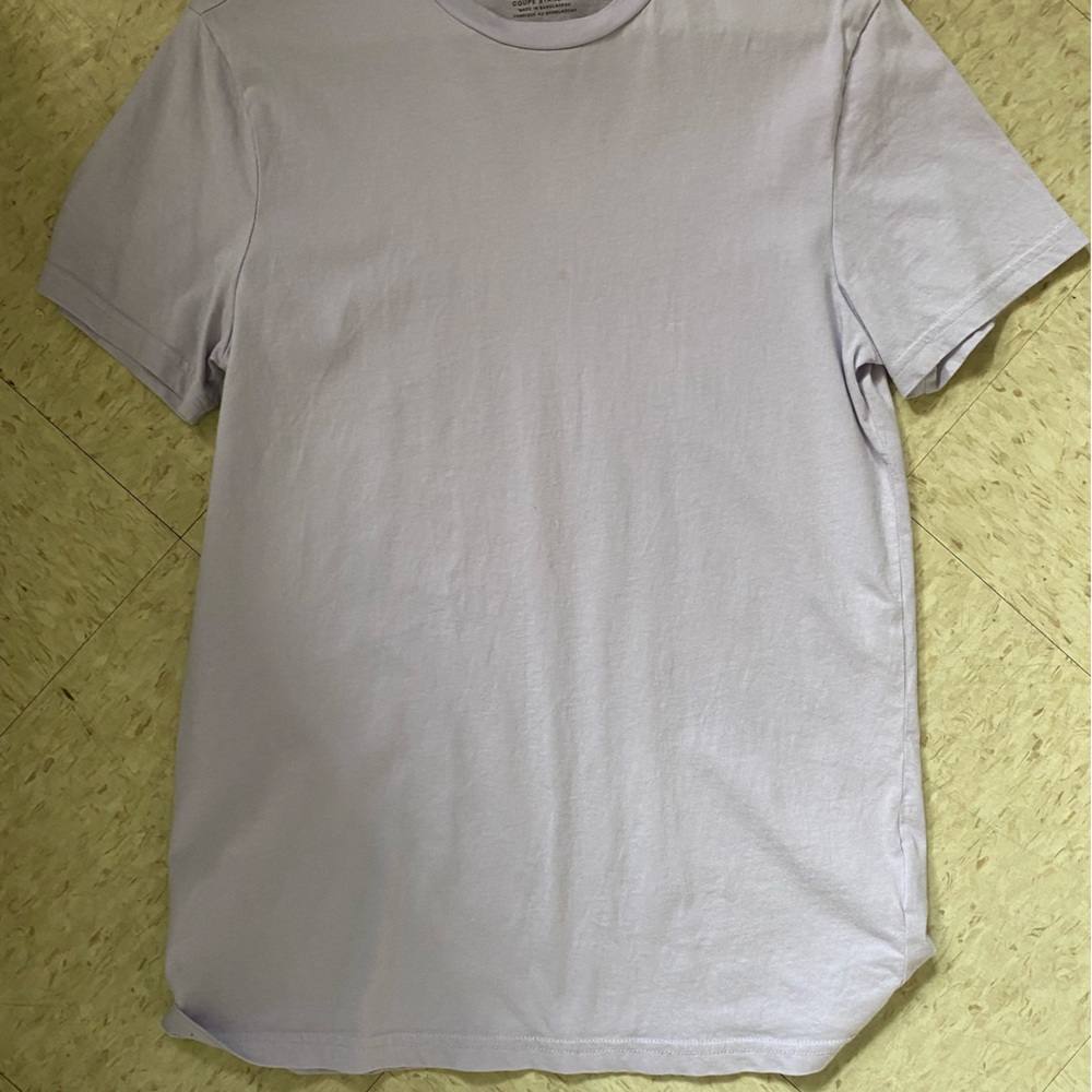 It is a light purple shirt from the H&M brand, little use, size S